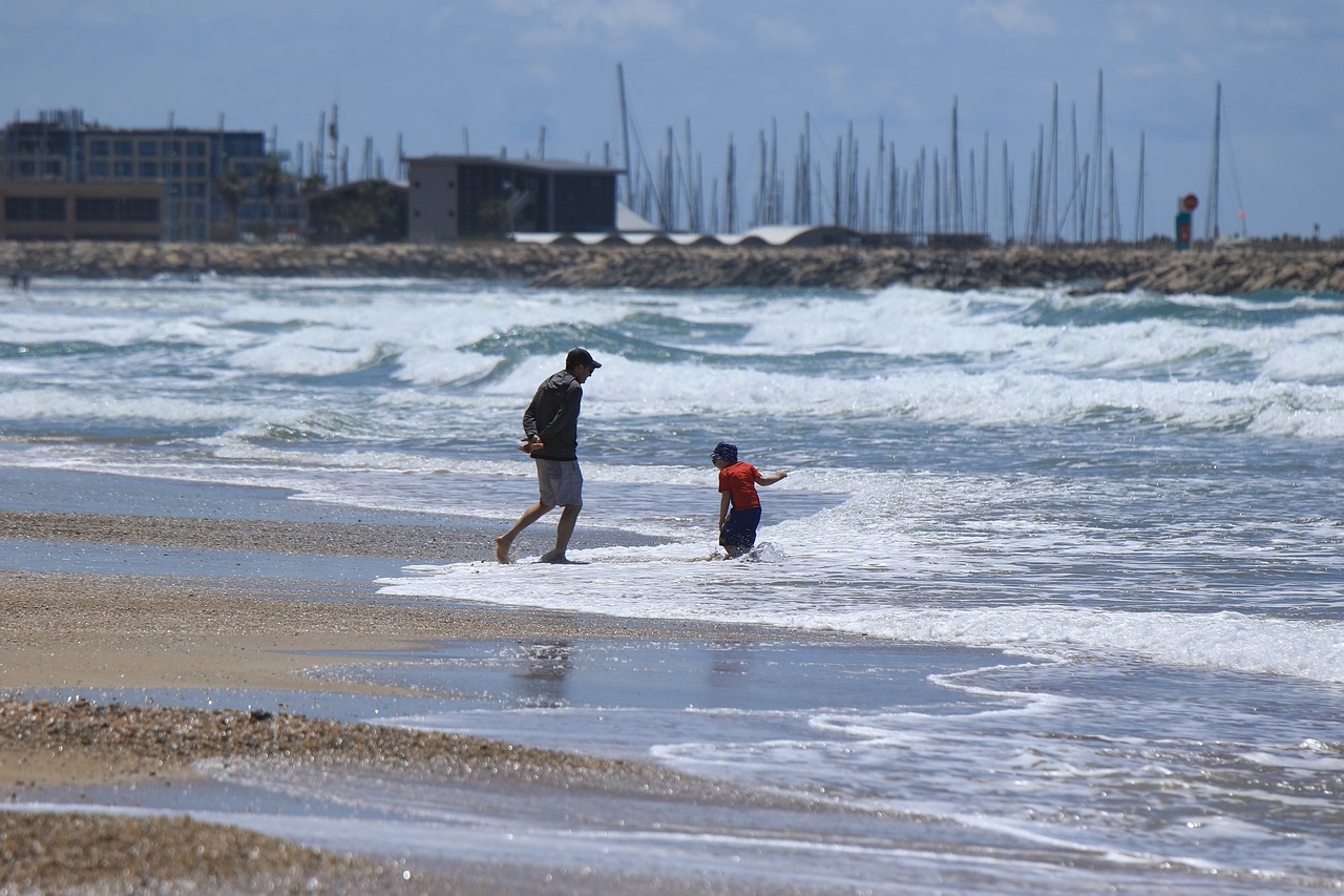 beach  sea  father free photo