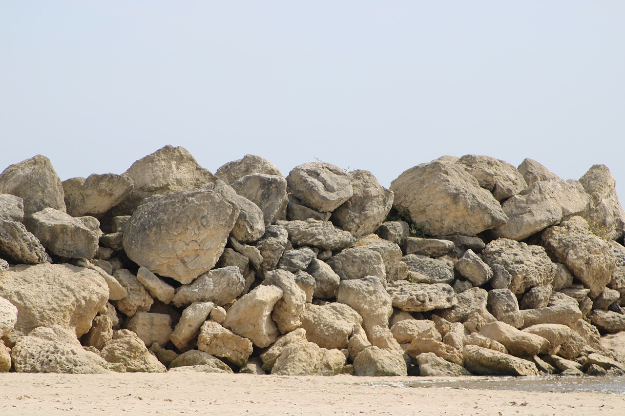 beach  rock  sand free photo