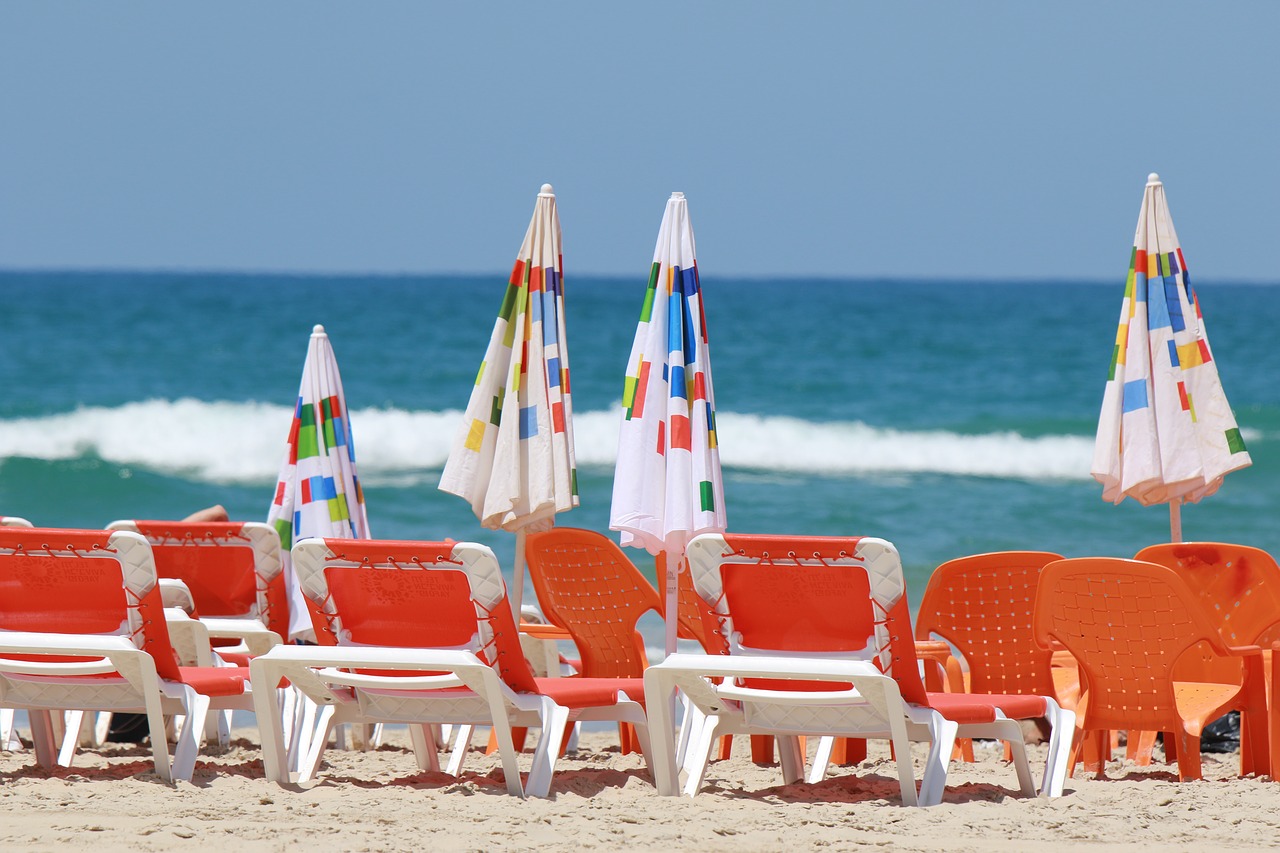 beach  beach chairs  umbrellas free photo