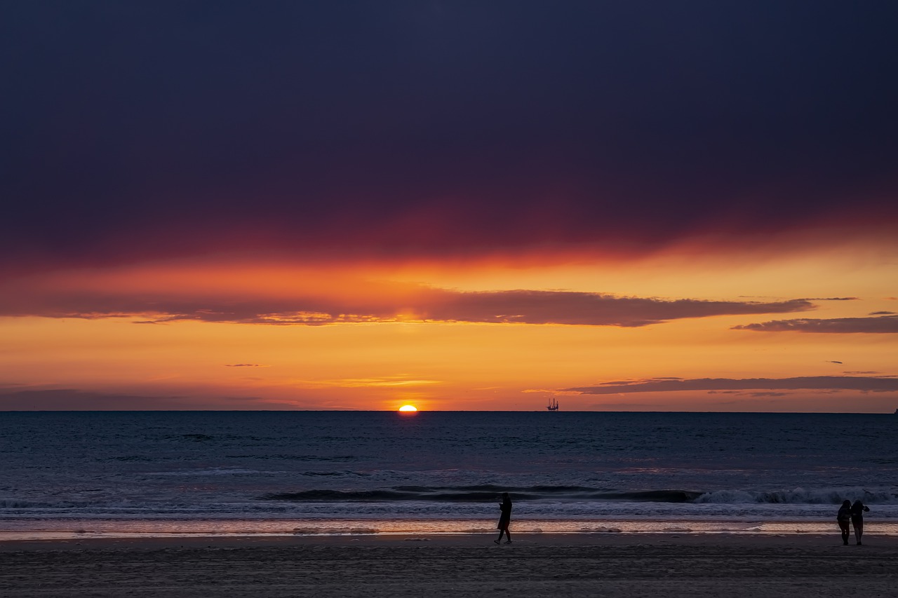 beach  sunset  sea free photo