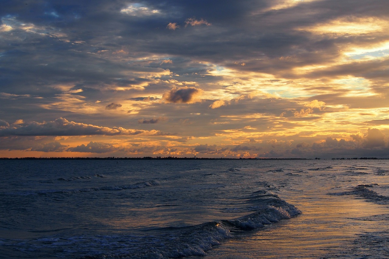 beach sunset clouds free photo