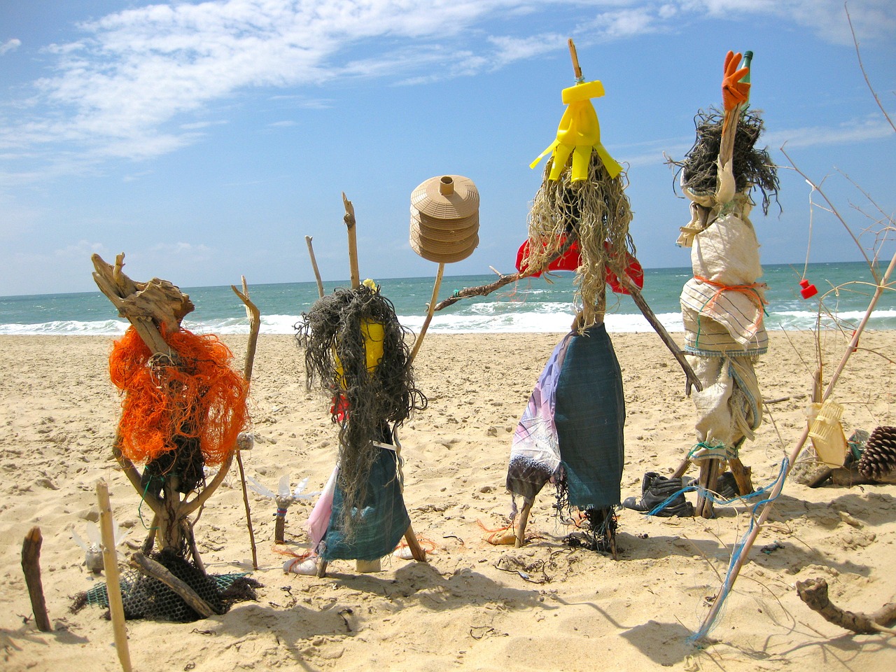 beach figures scarecrows free photo