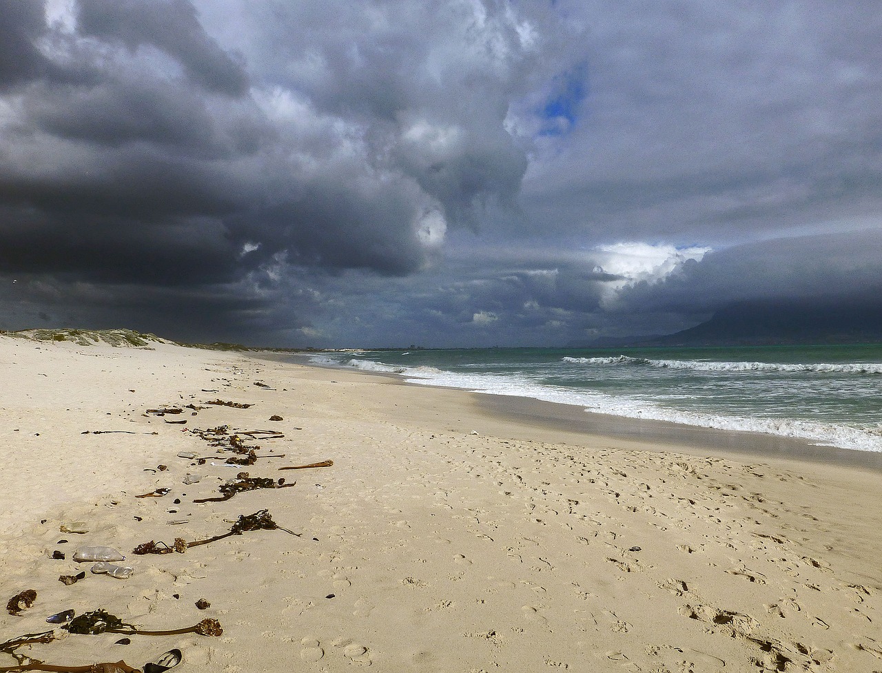 beach sand clouds free photo