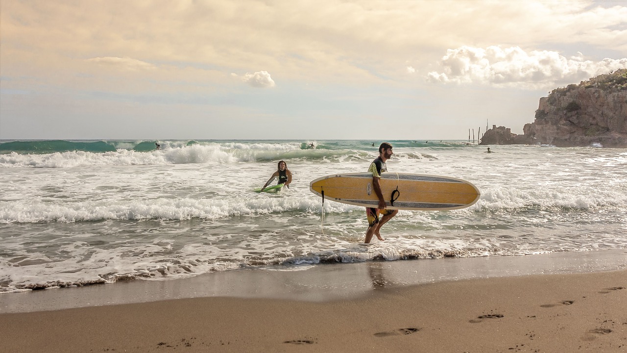 beach surfer surfboard free photo