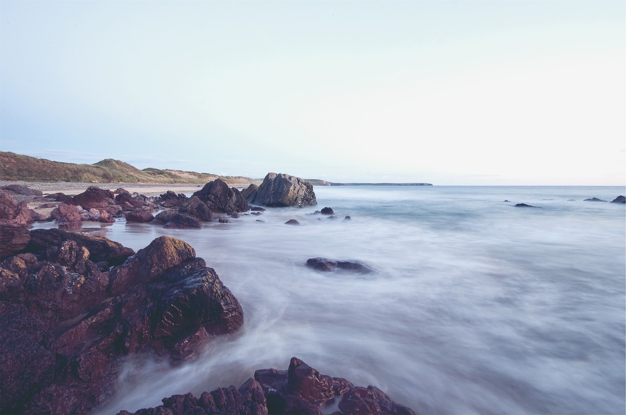 beach sand rocks free photo