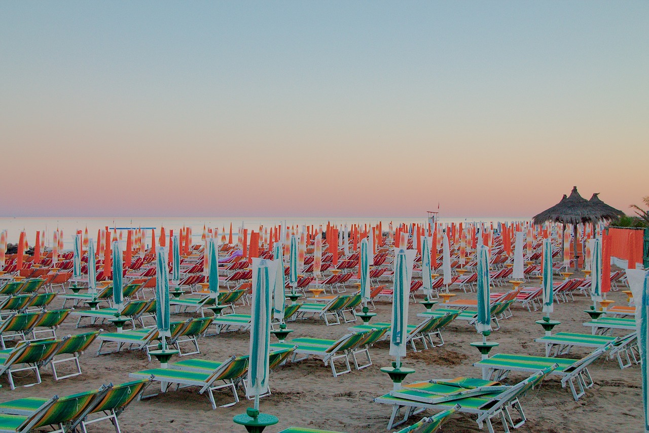 beach umbrellas sunset free photo