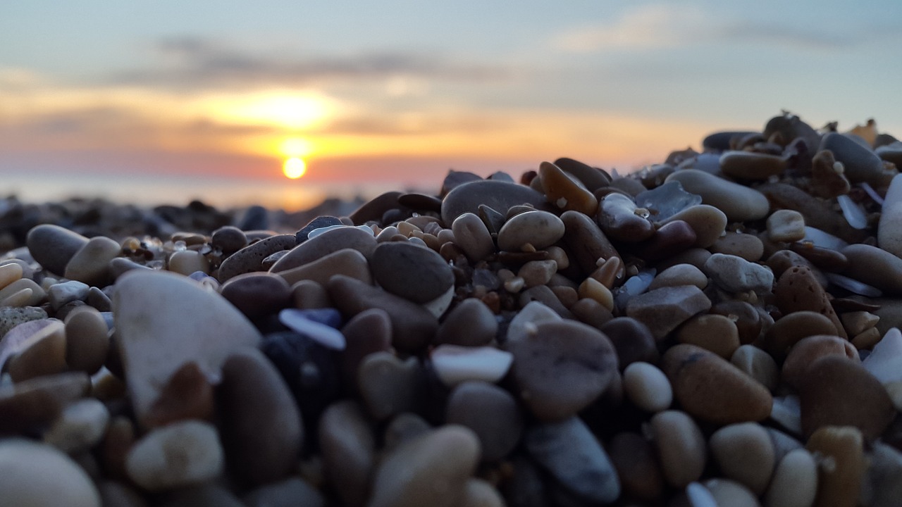 beach sunset rocks free photo