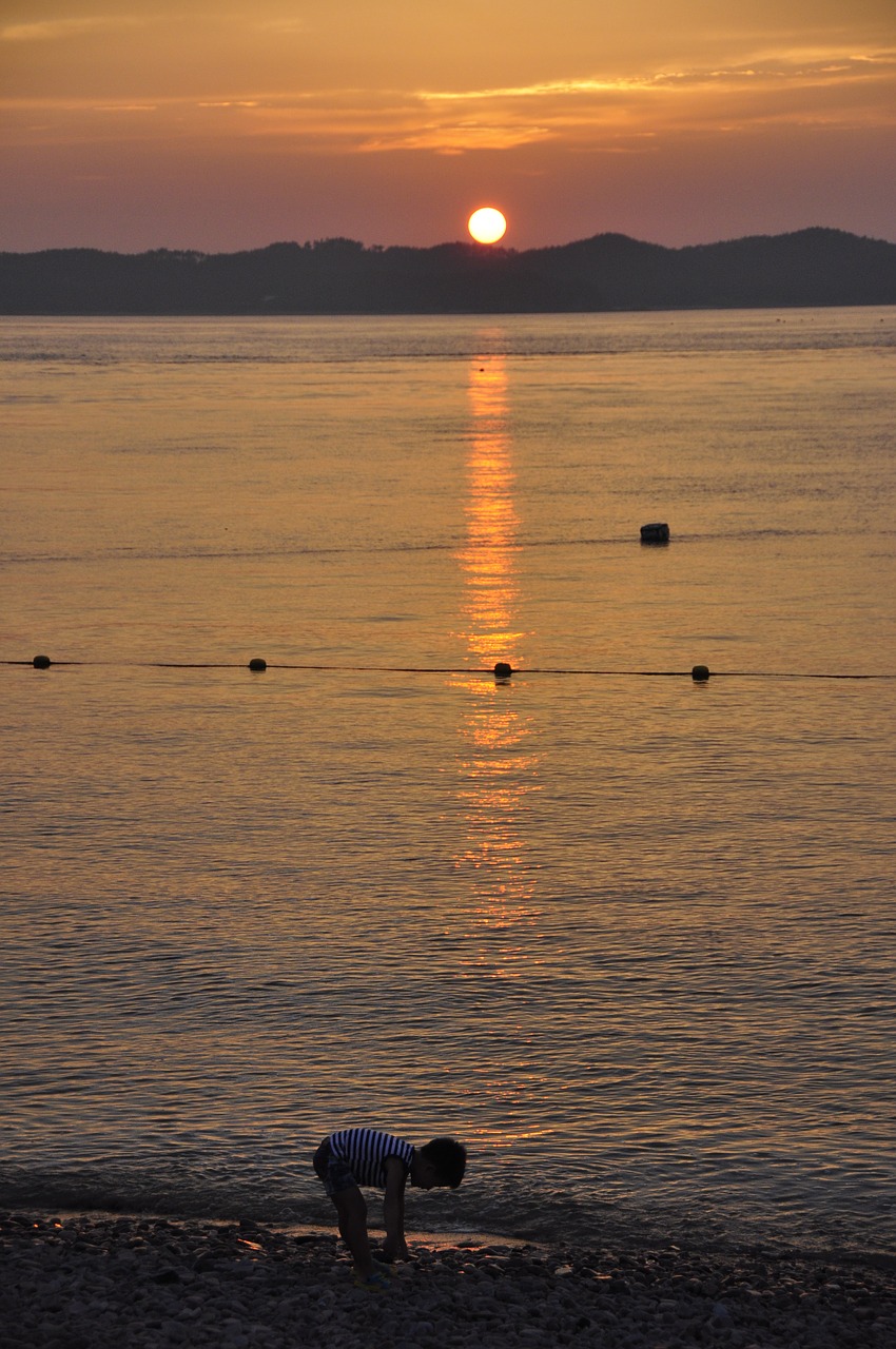 beach glow sunset free photo