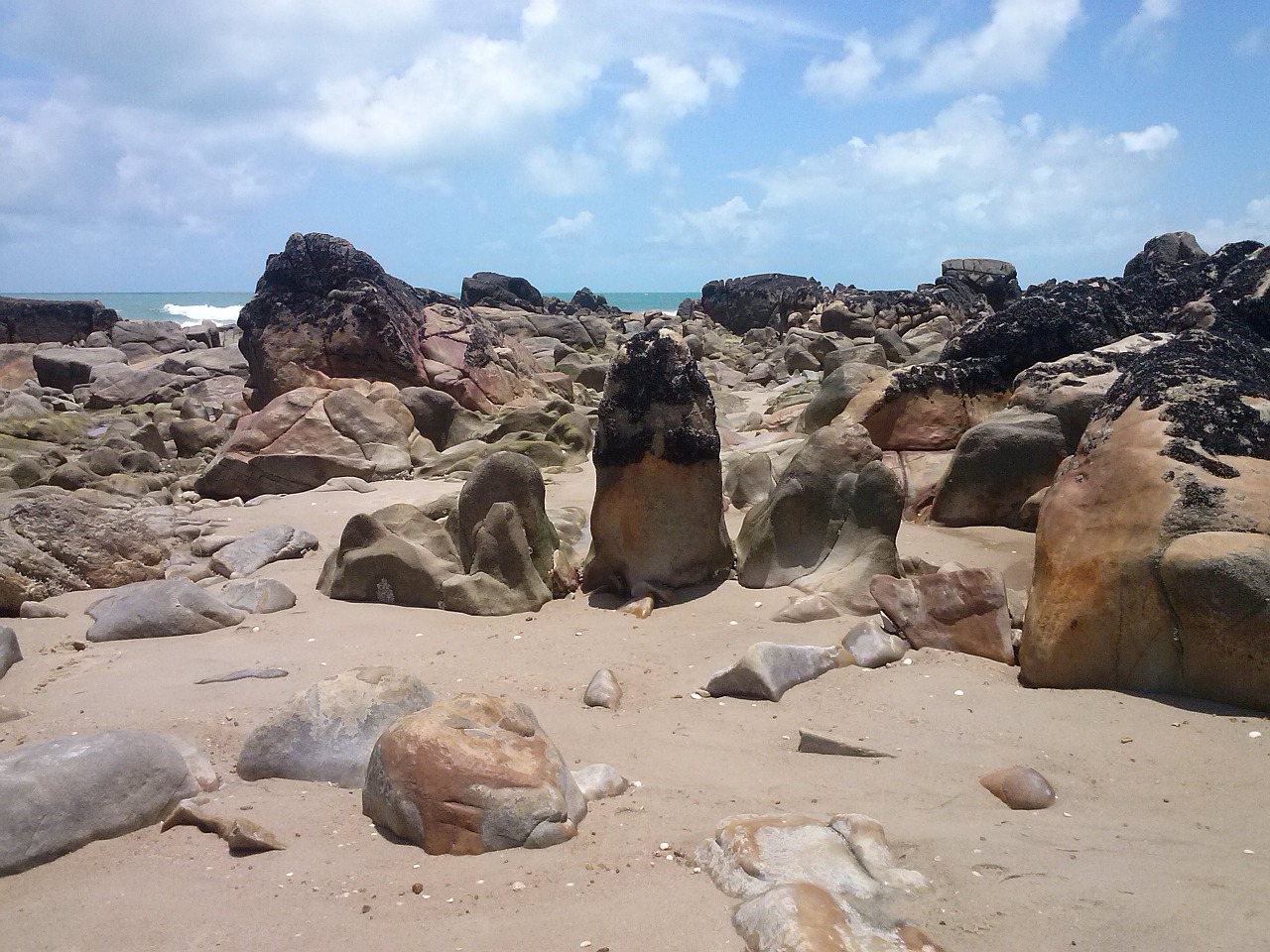 beach stones sand free photo