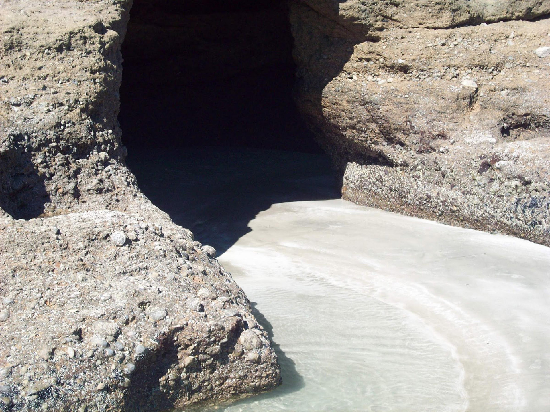 cave entrance cave beach cave free photo
