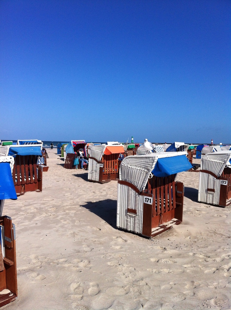 beach chair beach sky free photo