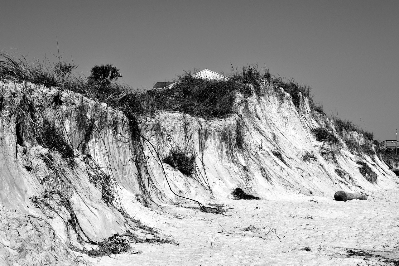 beach erosion  damage  hurricane free photo