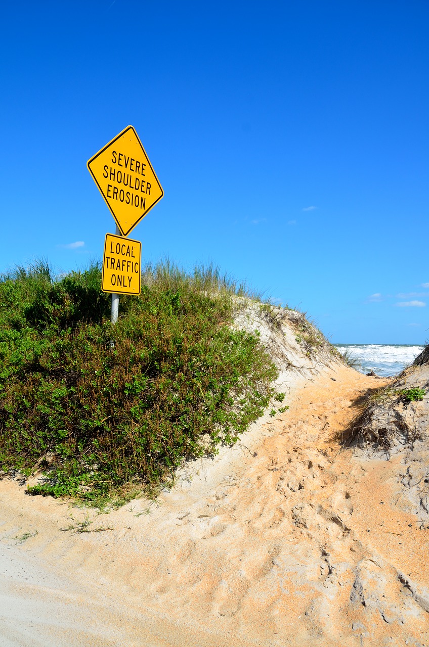 beach erosion sign beach outdoors free photo