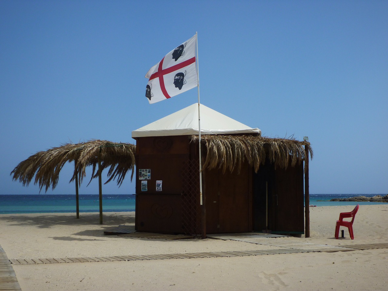 beach hut corsica holiday free photo