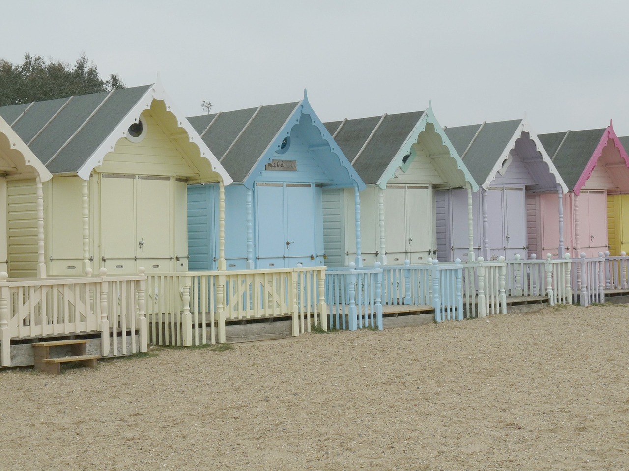 beach huts beach sand free photo