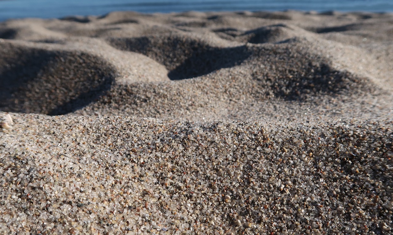 beach sand  quartz sand  grains of sand free photo