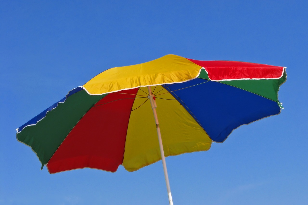 beach umbrella beach umbrellas free photo