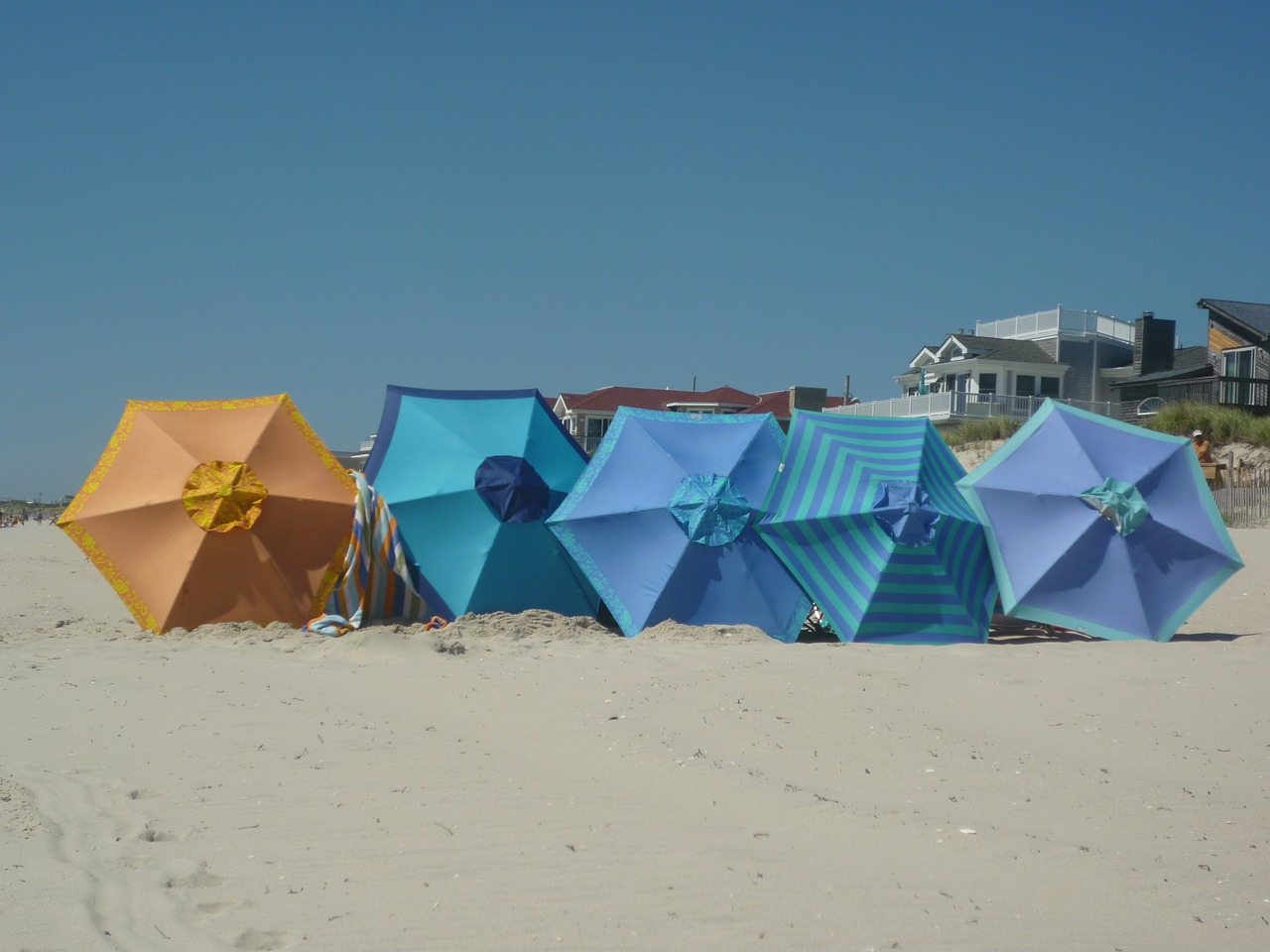 beach umbrella beach sand free photo