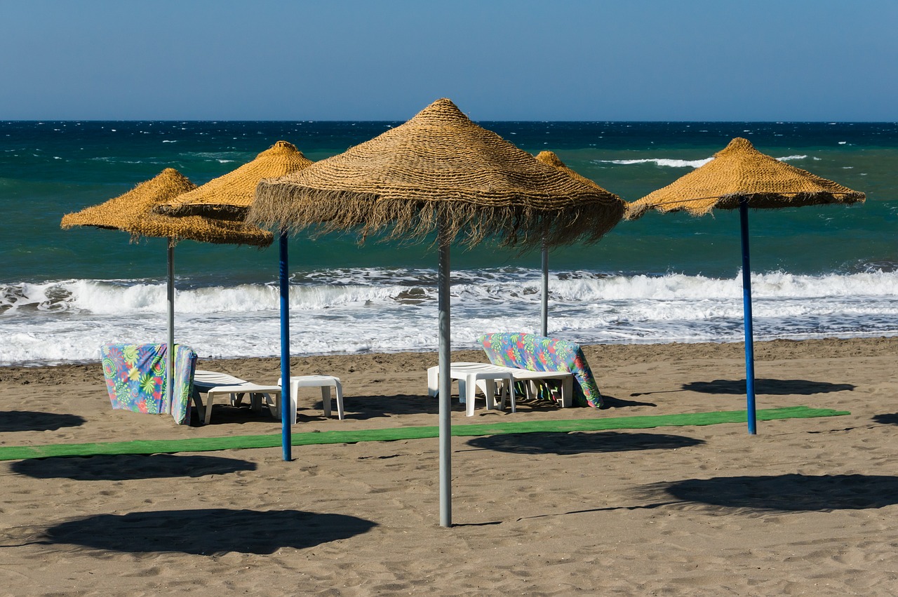 beach umbrellas spain andalusia free photo