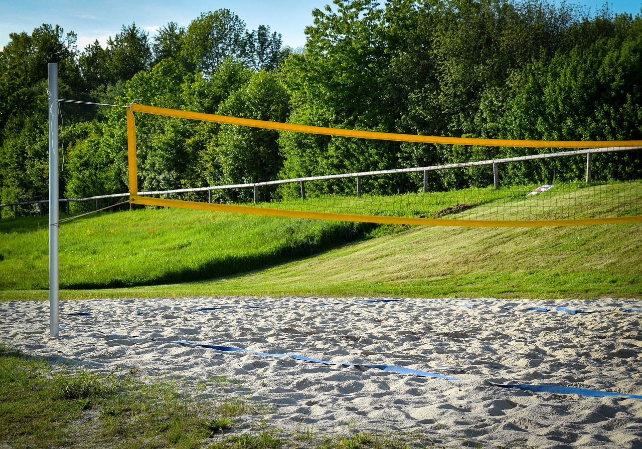 beach volleyball volleyball playing field free photo