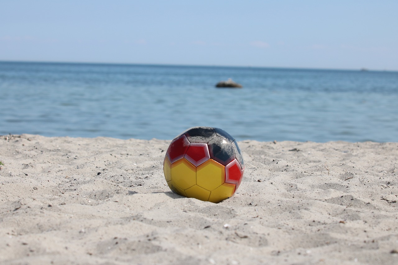 beach volleyball  ball  sand free photo