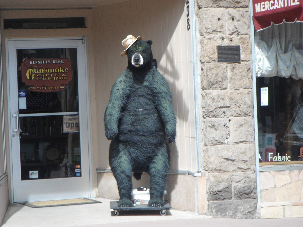 bear statue street city free photo