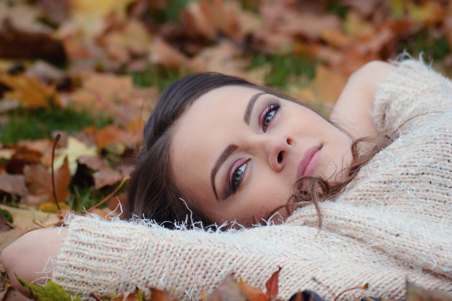 girl lying down autumn park portrait girl park free photo