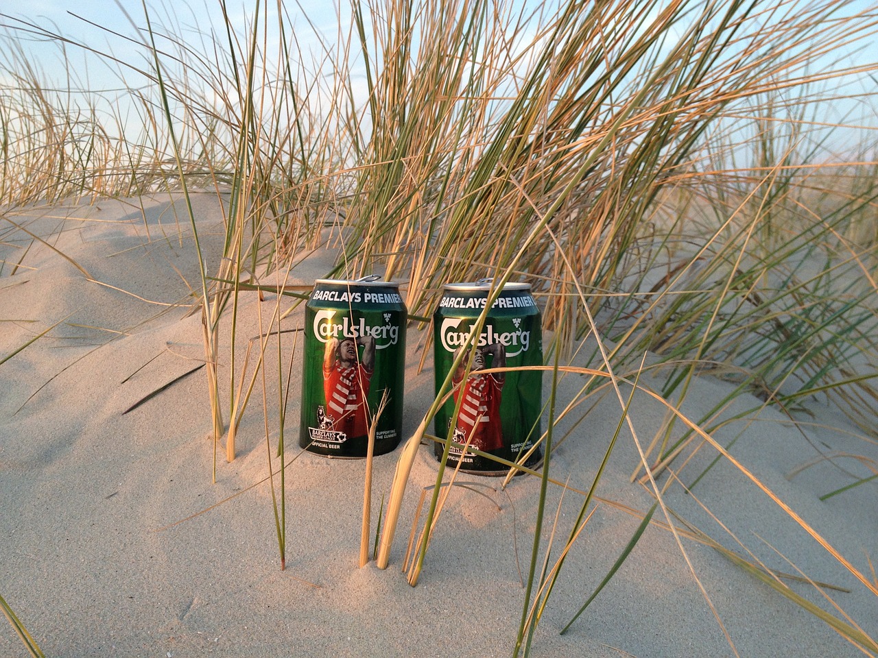 beer cans beach dune free photo