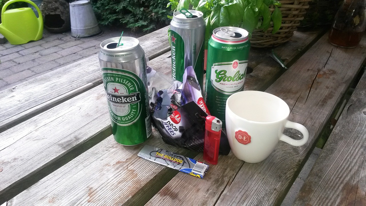 beer cans garden table unordnug free photo