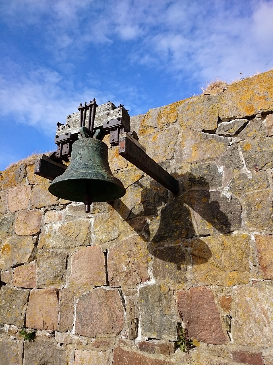 bell old stone wall free photo