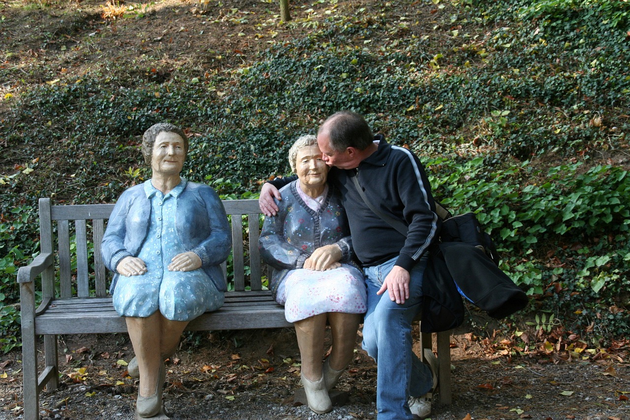 bench human figures free photo