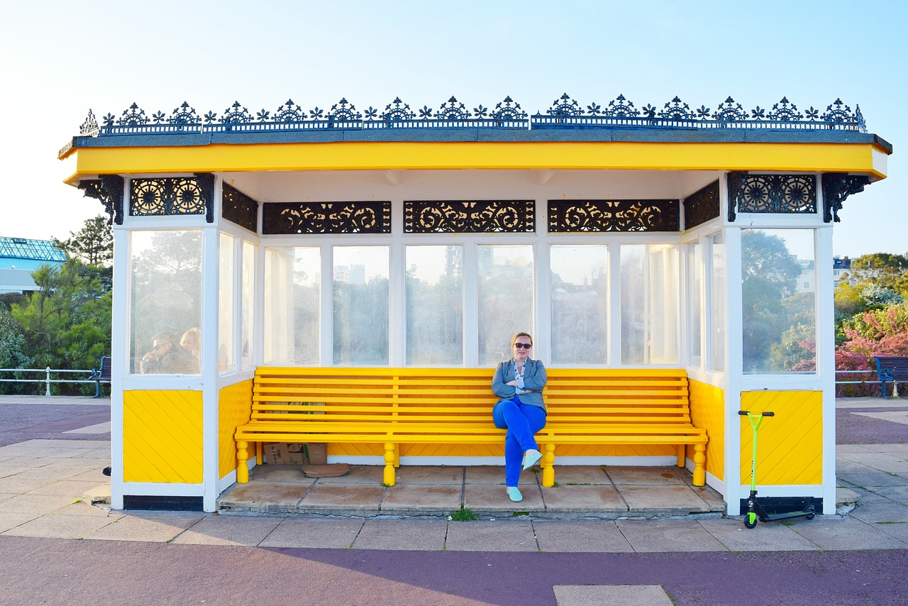 bench bus stop yellow free photo