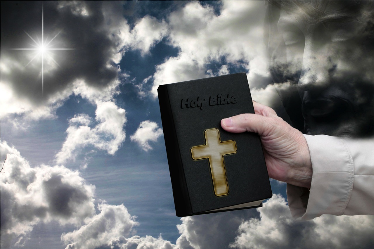 bible hand sky free photo