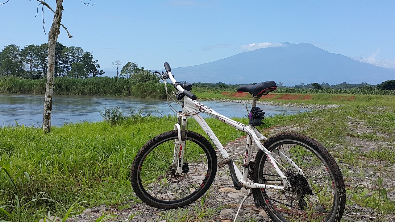 bicycle river mountain free photo