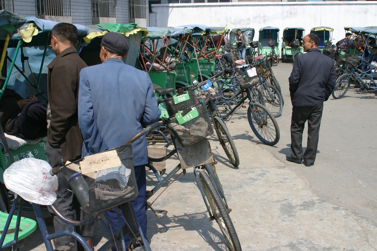 bicycle rickshaw china bicycle taxi station free photo