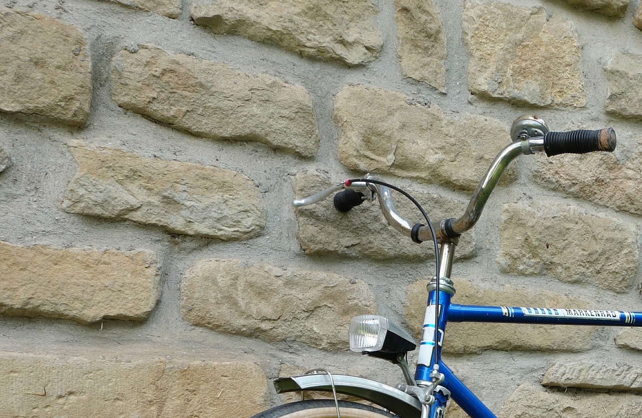 bike wall stone wall free photo