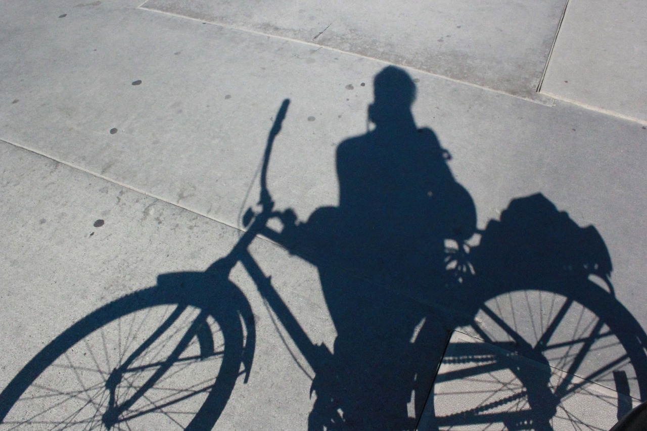 bike shadow character free photo