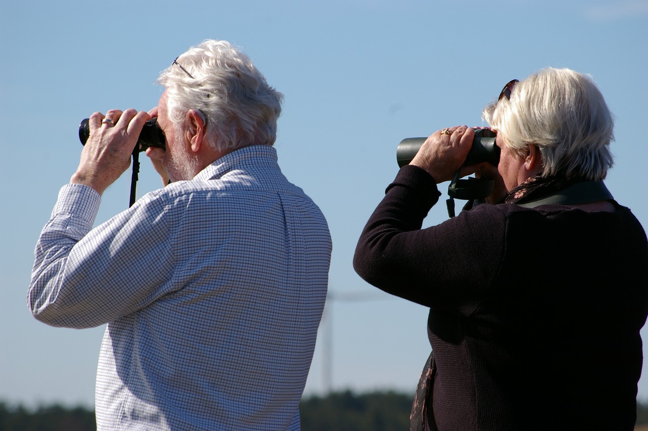 binoculars curious couple free photo