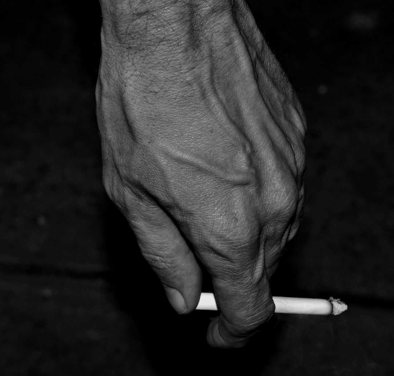 black and white hand cigarette free photo