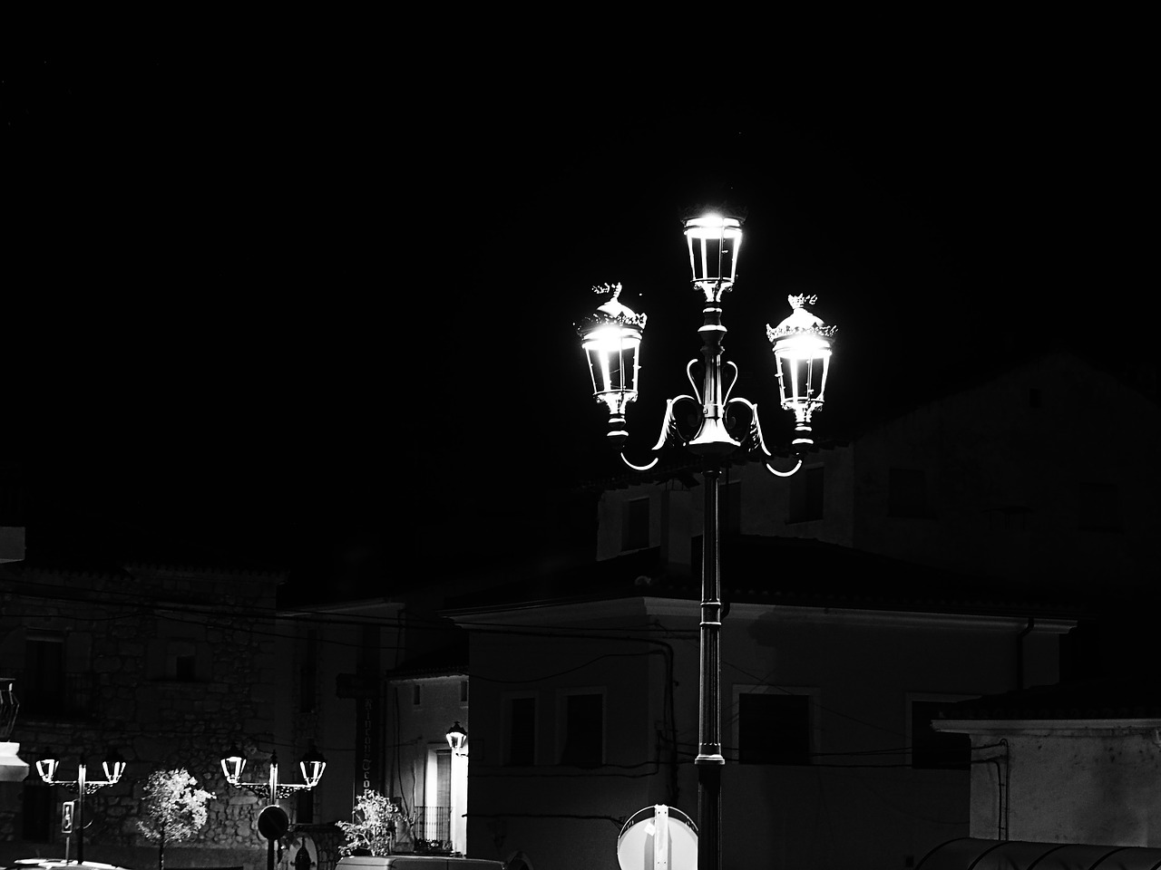 black and white street lamp people free photo