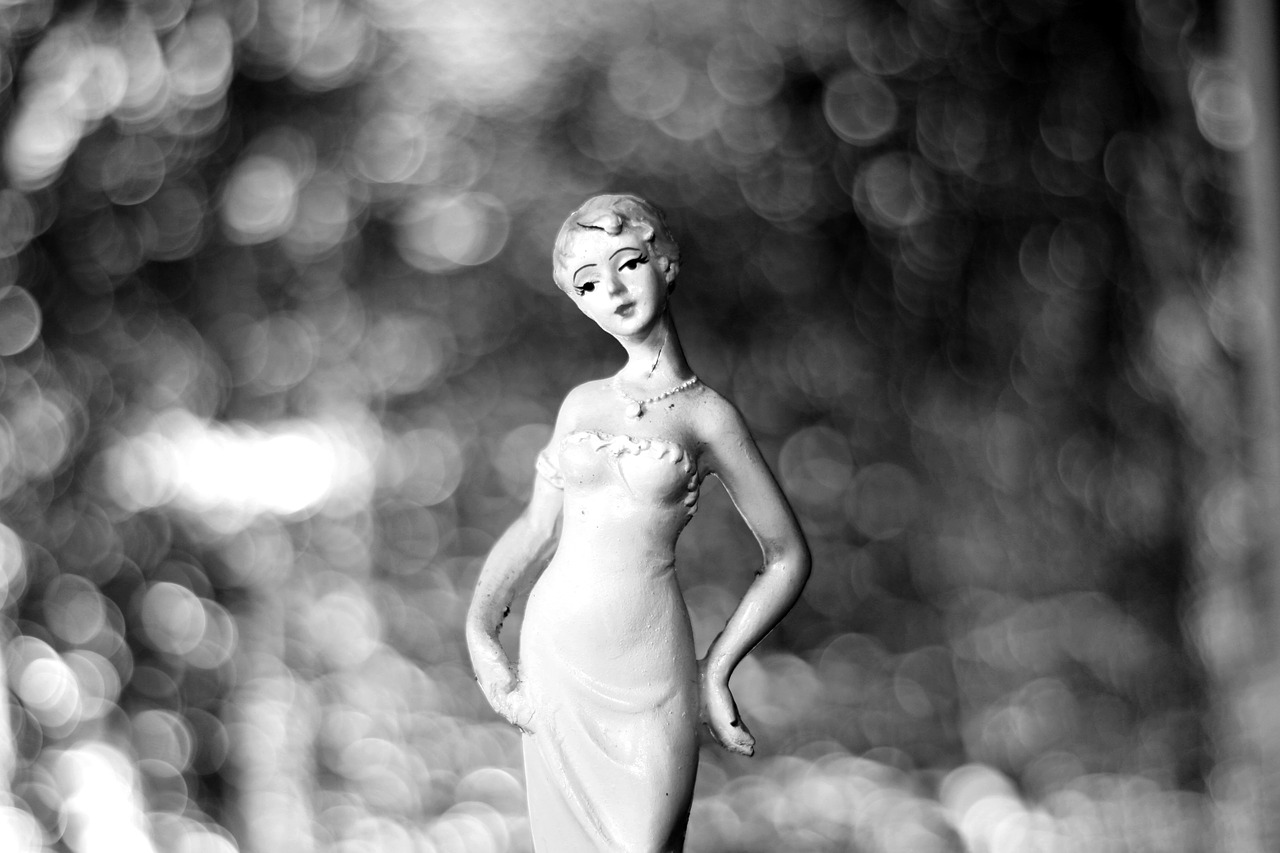 black and white woman figurine free photo