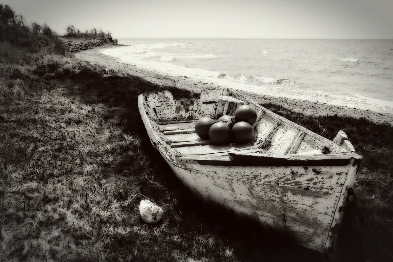 black and white fishing boat free photo