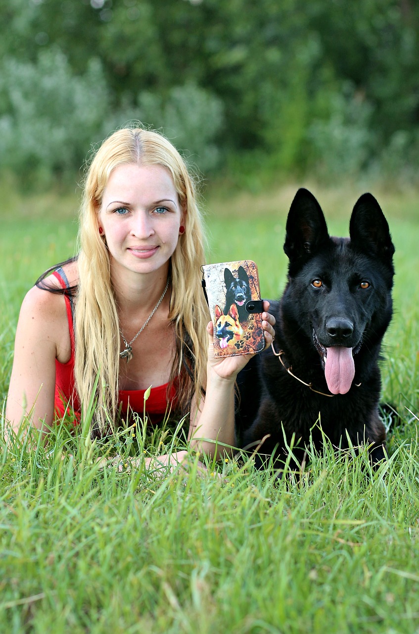 black german shepherd  dog  blonde woman free photo