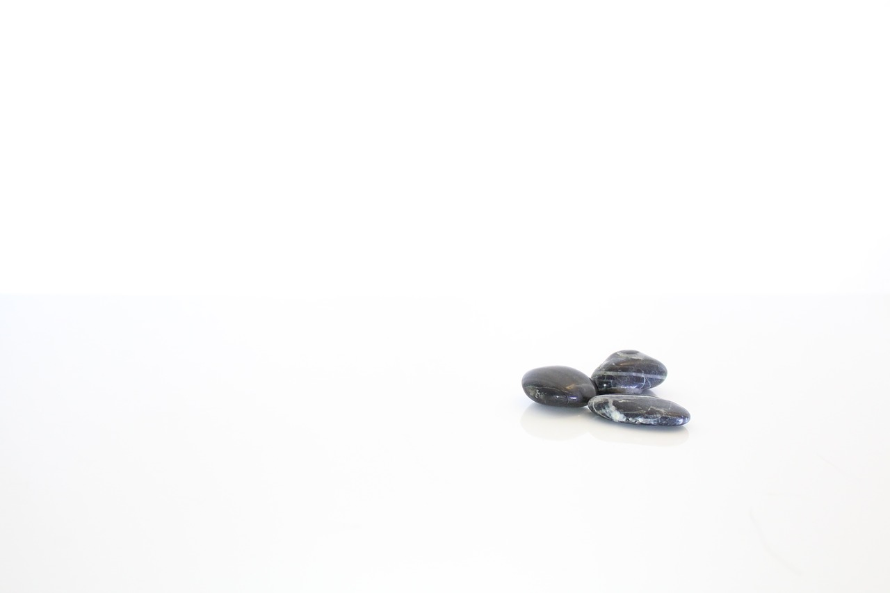 black pebble stones isolated stones stone free photo