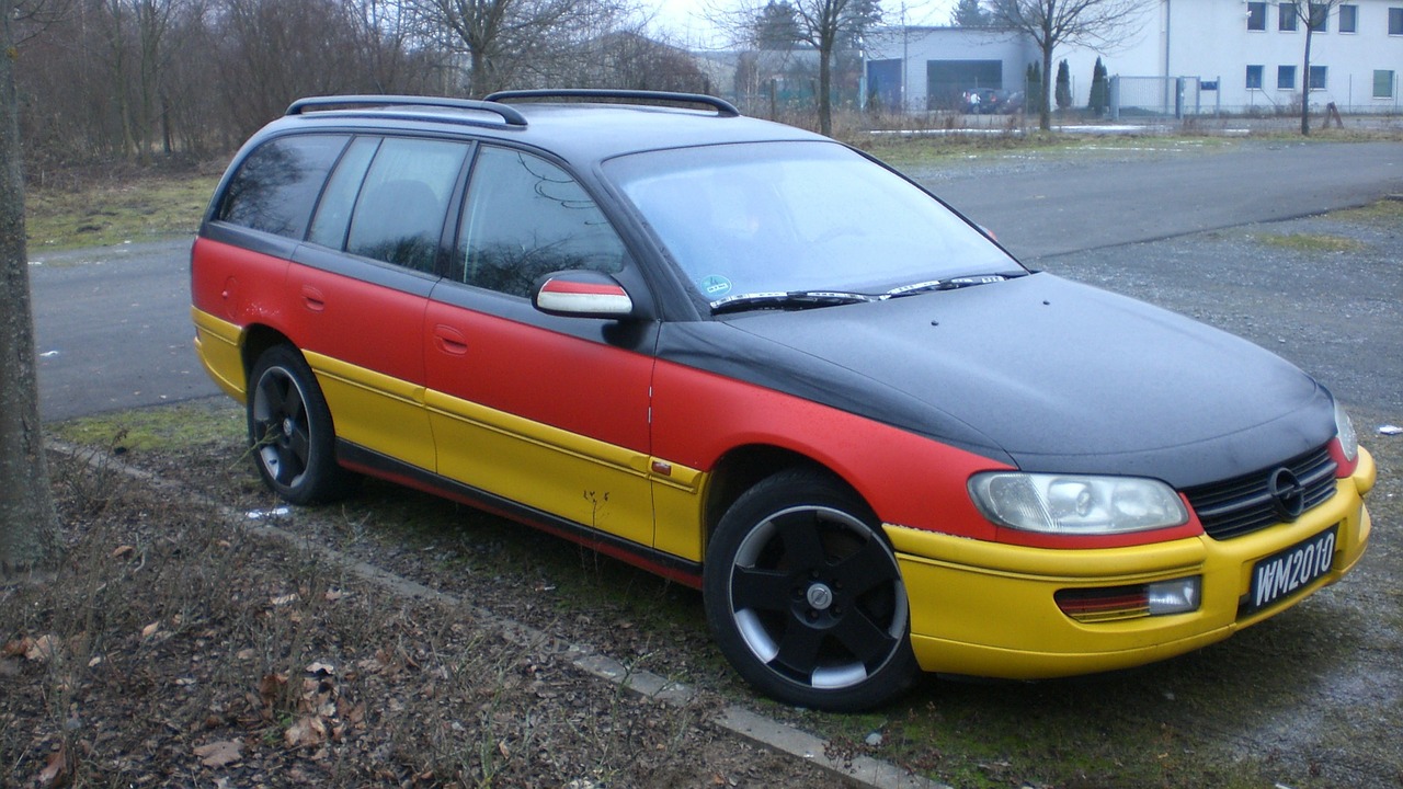 black red gold opel omega free photo