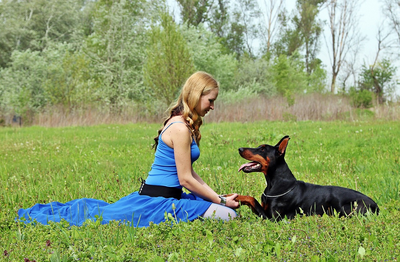 doberman woman and dog love free photo