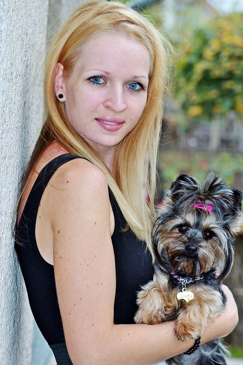 blonde woman smile yorkie free photo