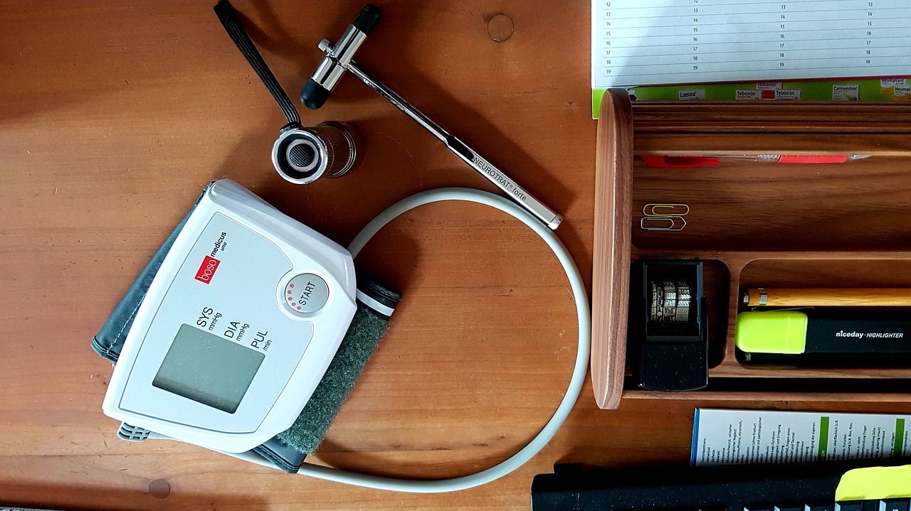 blood pressure monitor  reflex hammer  investigation free photo