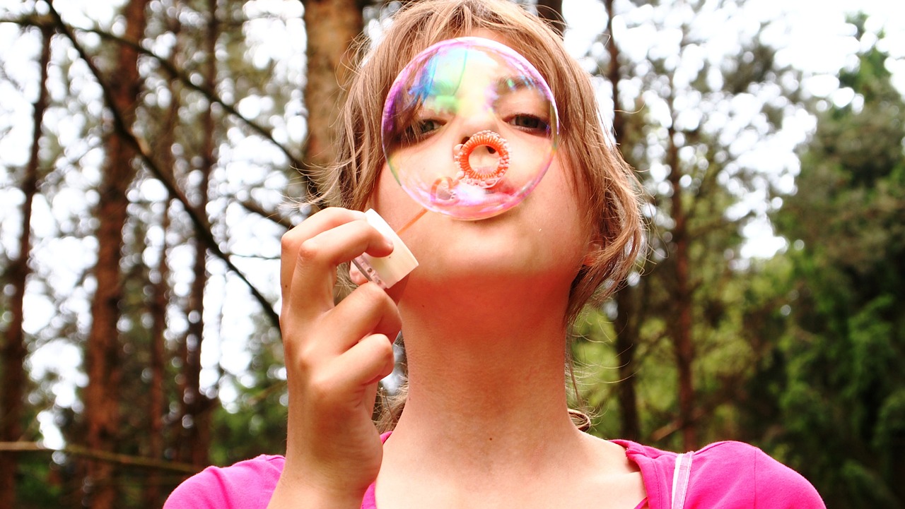 blow bubbles girl forest free photo