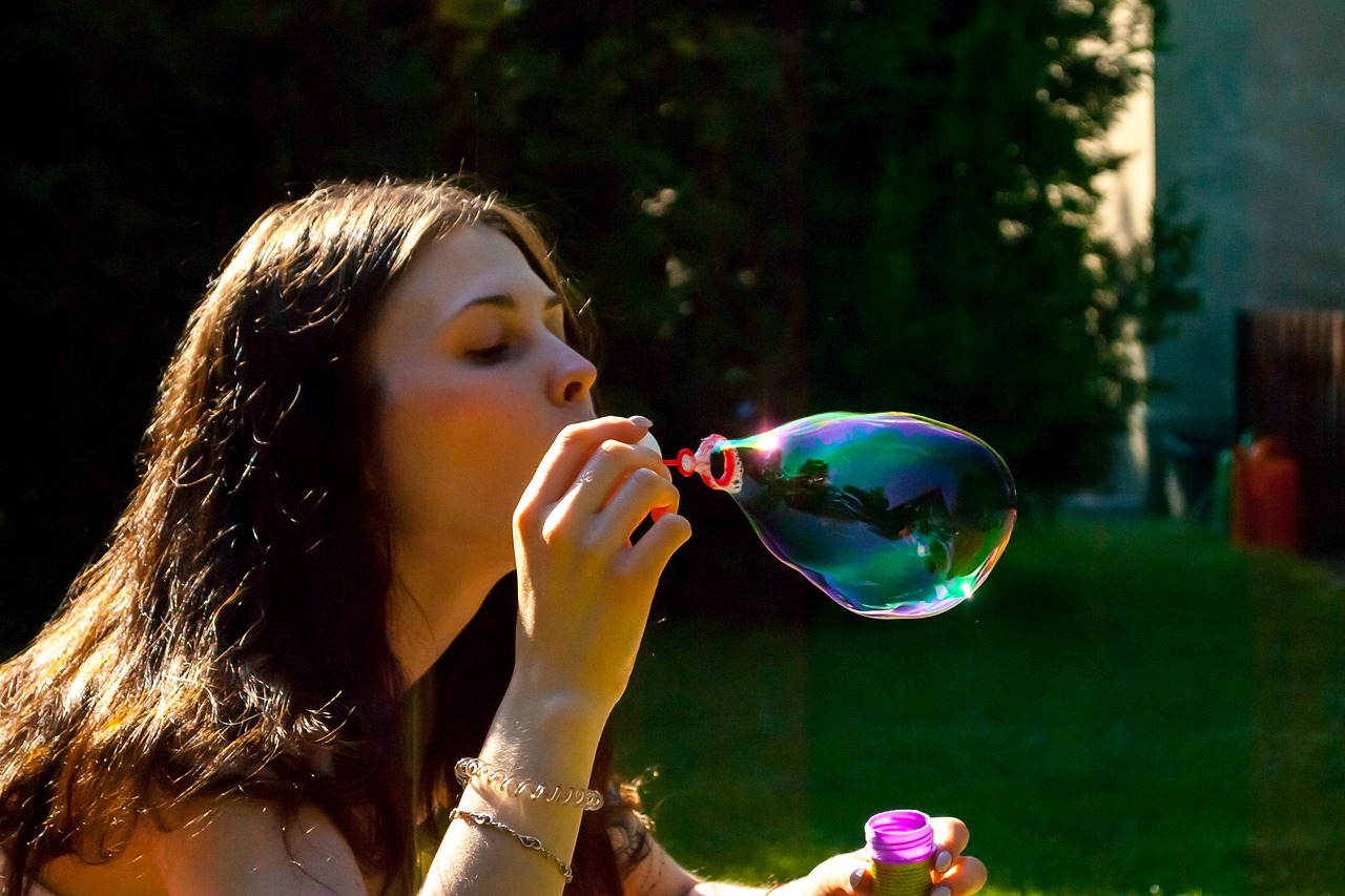 blowing soap bubbles bubbles free photo